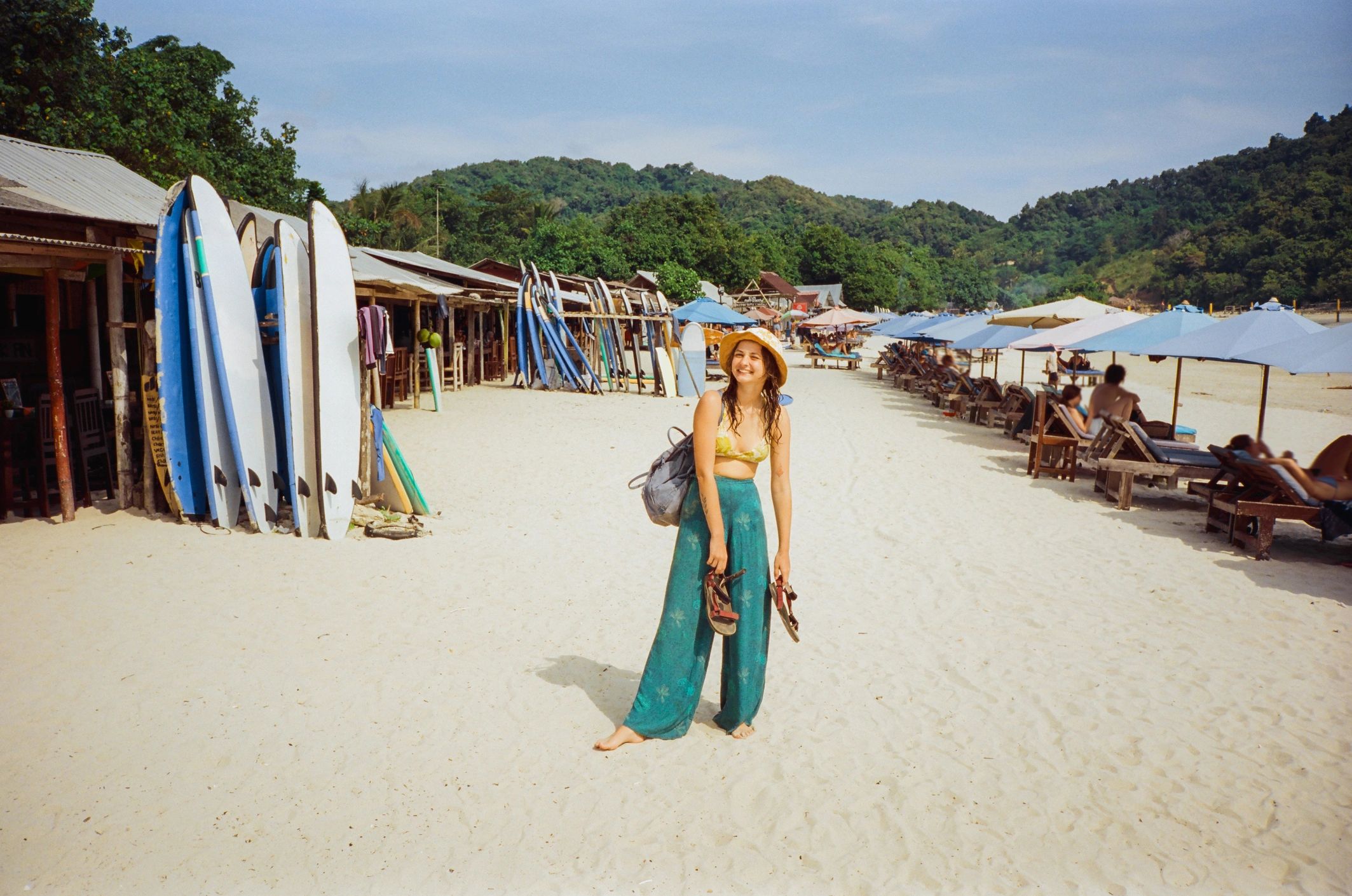 Happy beach traveler enjoying an island day