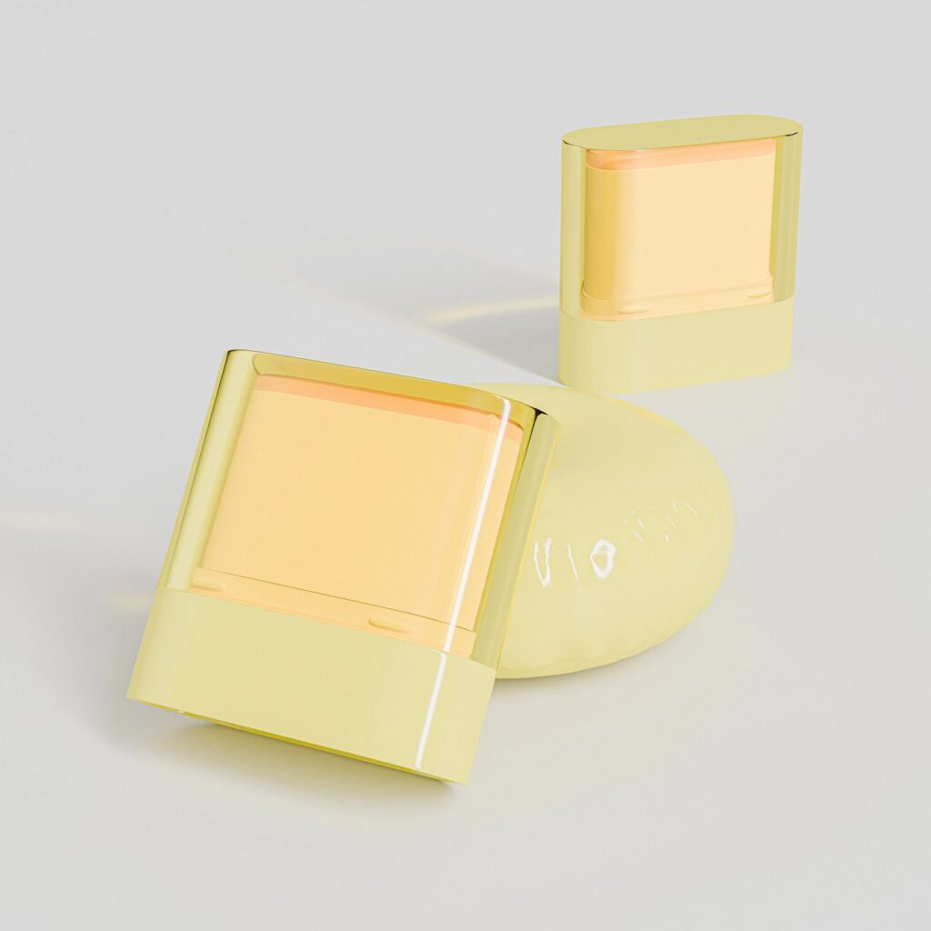 mini size Rotating Sunscreen Stick mockup, twist up tube cosmetic blush stick packaging, yellow plastic solid cream container with transparent cap, Push up Antiperspirant Deodorant Tube Packaging